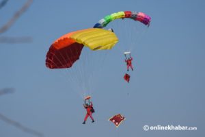 Army staffer injured after he fell from parachute during celebration