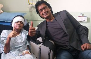 Rajesh Hamal at hospital to motivate Birgunj acid attack survivor