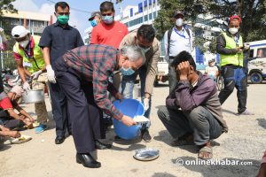 Baburam Bhattarai at Khulamanch to feed needy