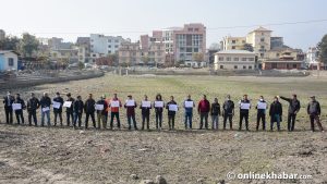 Kathmandu activists smear mud on faces protesting Kamalpokhari’s ‘concretisation’