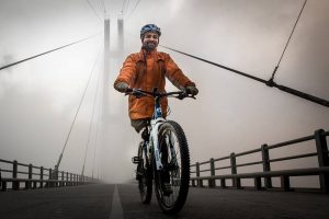 Yam Lal Rasaily cycles to prove his independence as a single-leg amputee