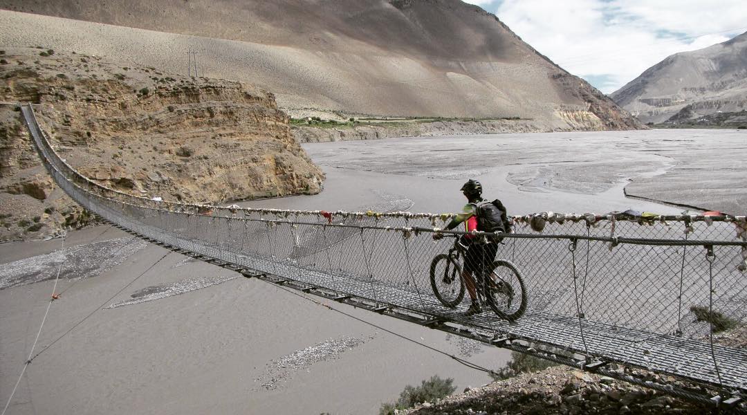 Nishma Shrestha cycling in Mustang