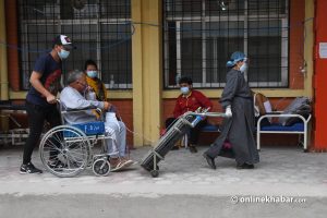 Covid-19 Nepal: Underpaid health workers do their best to save lives at Kathmandu’s ill-equipped hospital