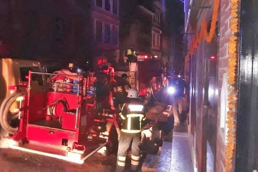 A fire engine tries to contain a fire in Mangalbajar of Lalitpur, on Friday, November 5, 2021.