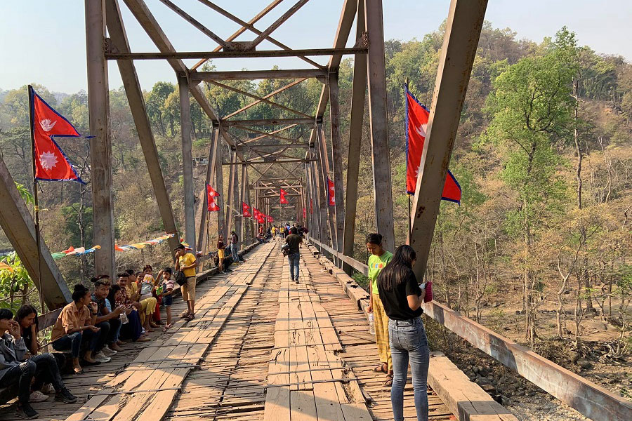 A wooden bridge over the Godawari river in Kailali