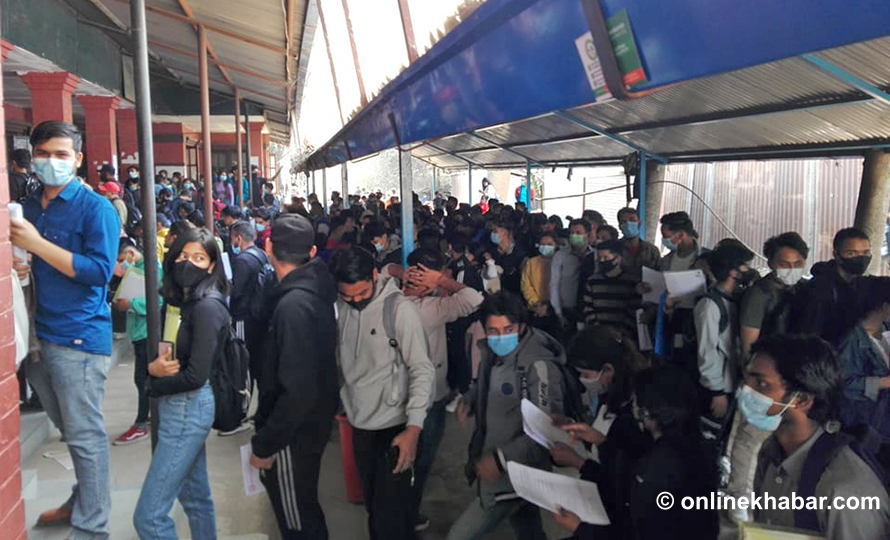 File: Students line up to obtain no-objection certificates (NOCs) to go abroad for education. studying abroad abroad studies NOC Online