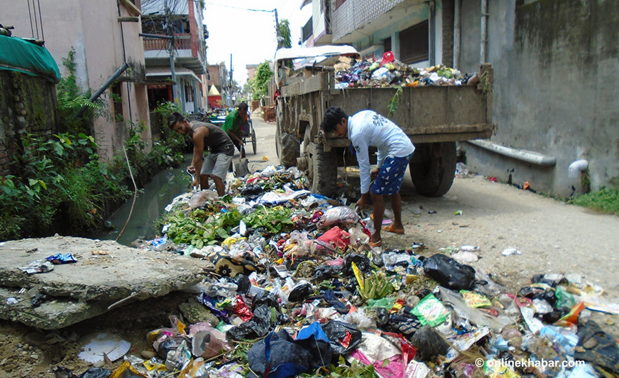 File: Waste piles up on a roadside in Terai, Nepal's southern plains. Waste management