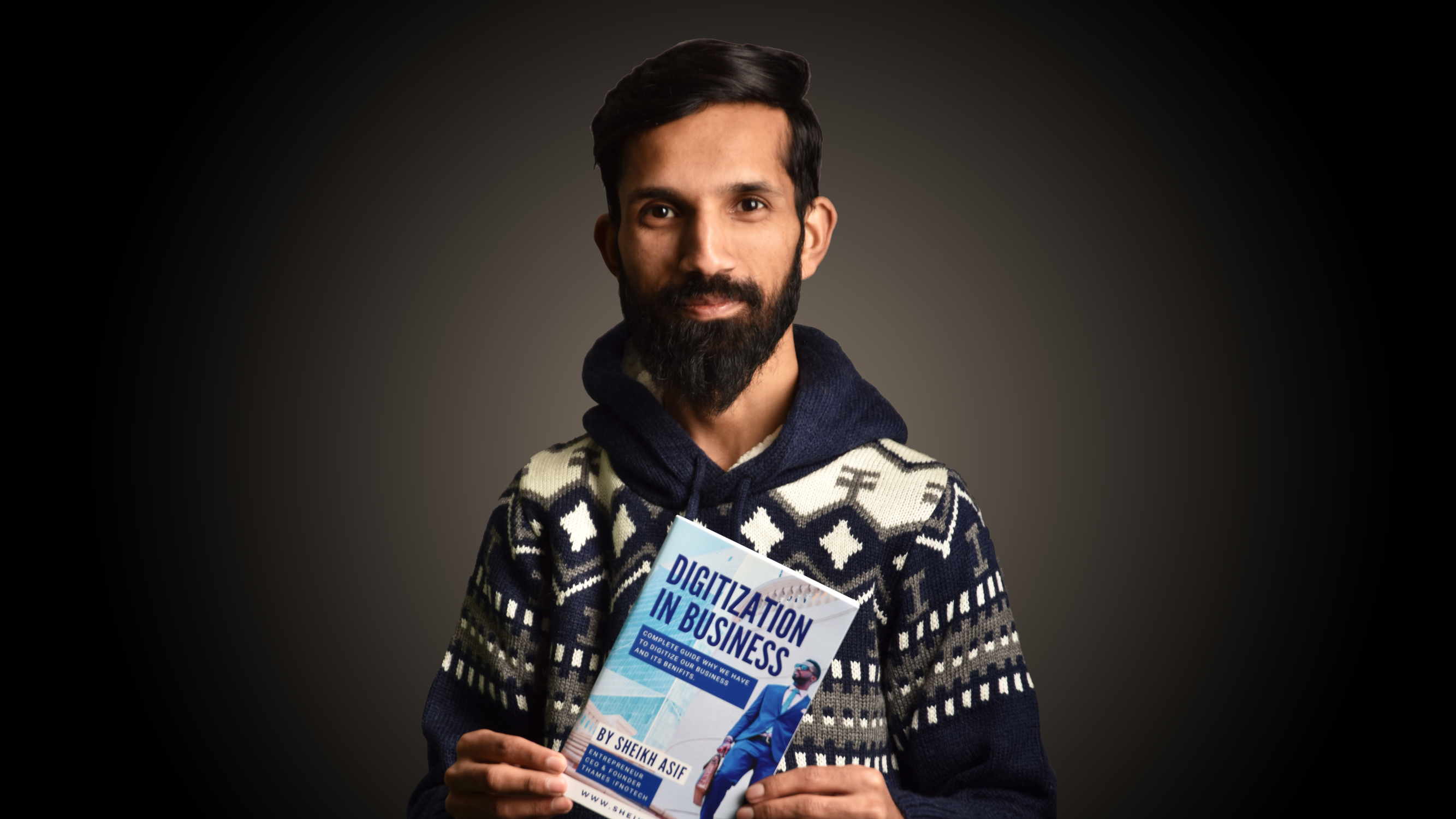 Sheikh Asif with one of his books