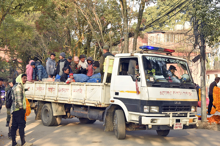 Kathmandu city police relocate flower sellers to designated area