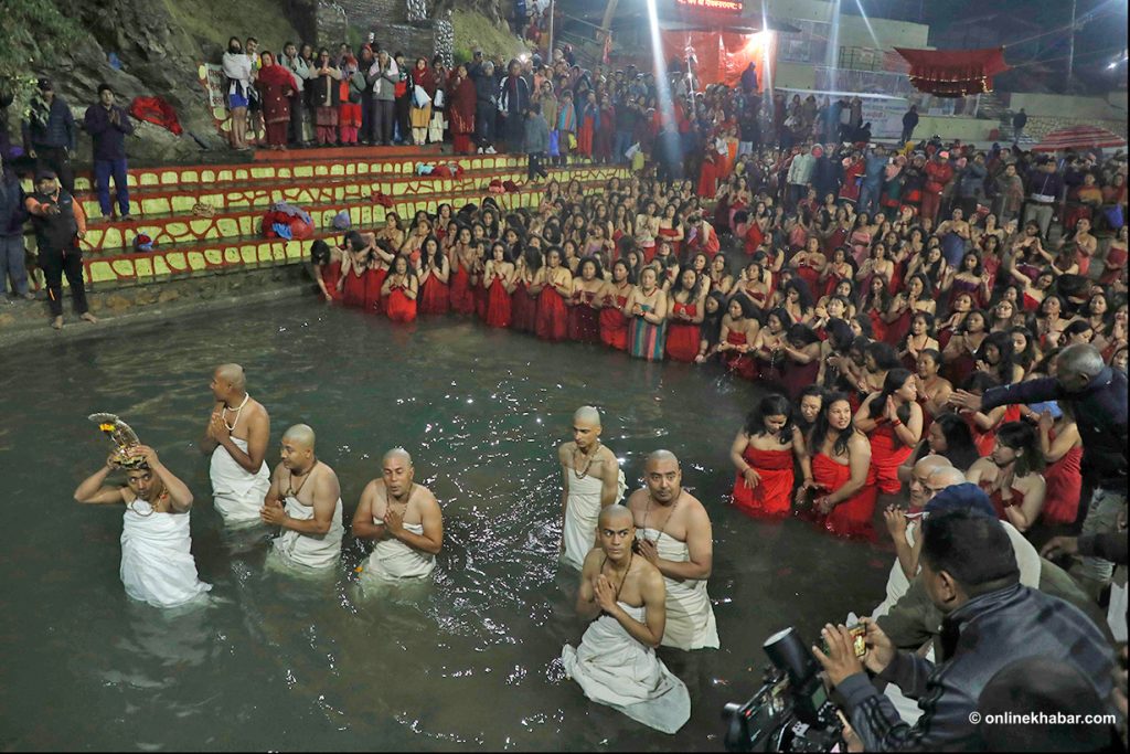 Pilgrims bathe in Shali River as Swasthani Brata Katha begins (Photos)